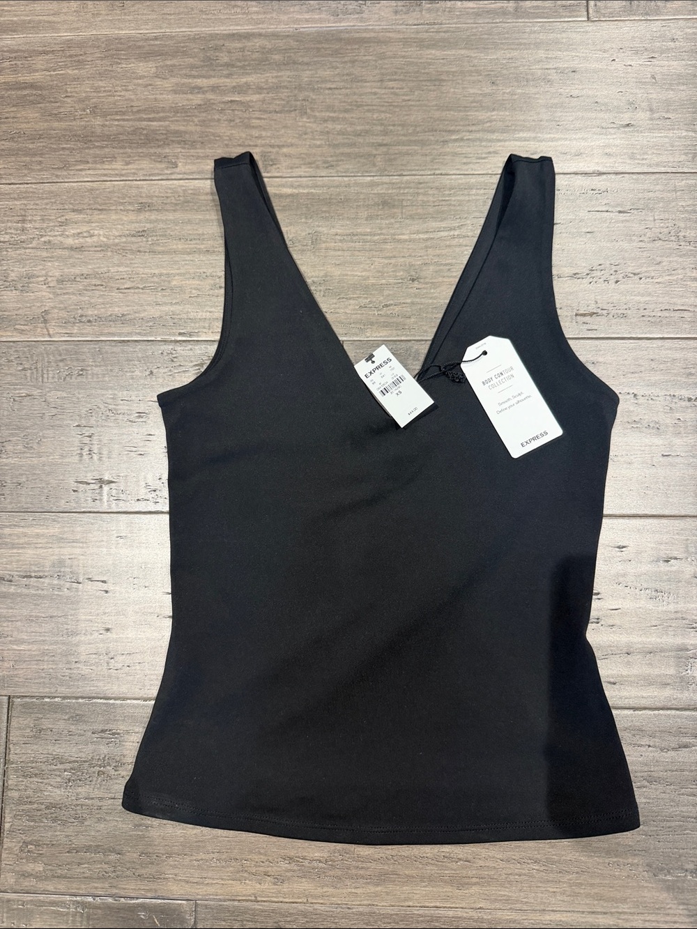 Express Black Deep V-Neck Ribbed Tank Top body contour